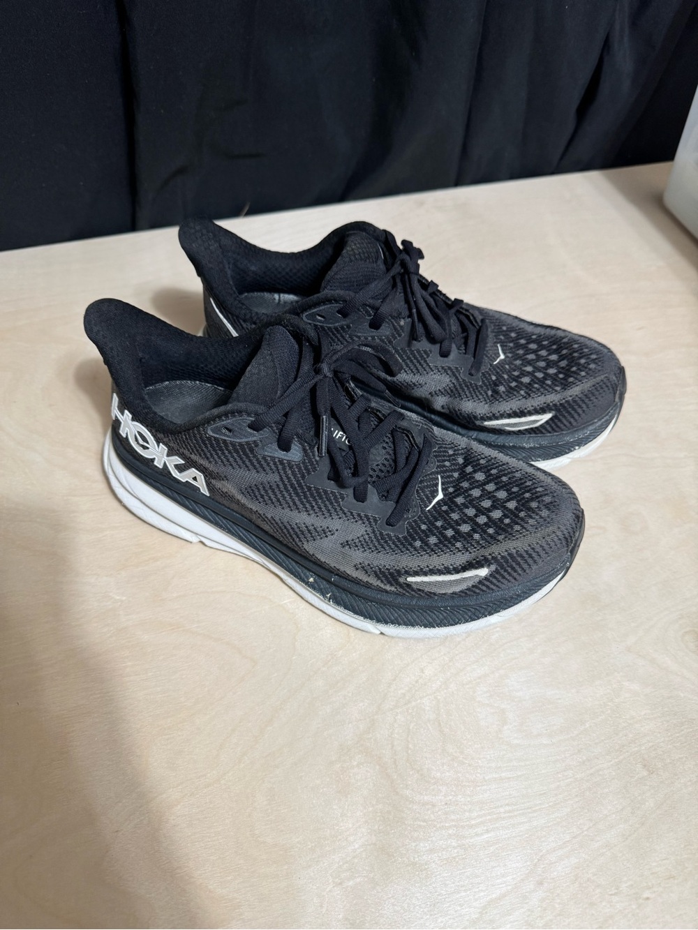 Hoka women’s Black Running Clifton 9 Shoes